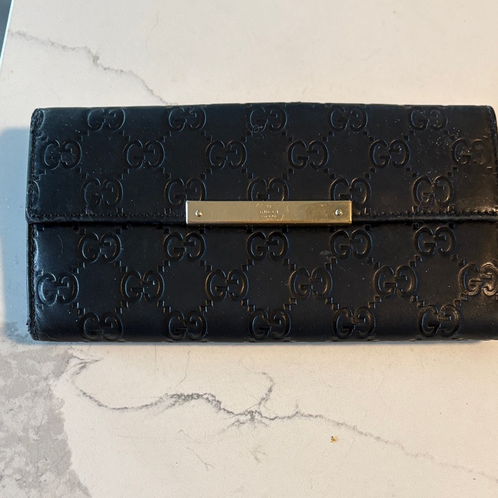 Gucci Embossed Black Leather Wallet